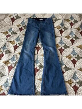 Free People blue denim pull on flare jeans 1970s vibe hippie stretchy waist